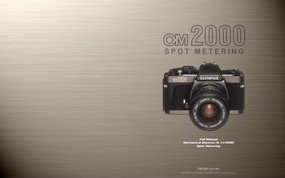 Olympus 奥林巴斯相机壁纸 70年经典 下辑 传统相机 OM2000 相机 Olympus Camera OM2000 Camera 奥林巴斯70年经典相机(二) 广告壁纸