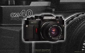 Olympus 奥林巴斯相机壁纸 70年经典 下辑 1985年的相机 OM40 相机 Olympus Camera OM40 Camera 奥林巴斯70年经典相机(二) 广告壁纸