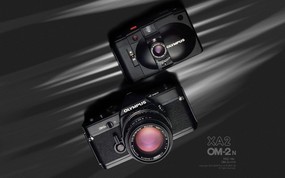  1979 1980年的奥林巴斯相机 Olympus Camera in 1979 1980 Olympus 奥林巴斯70年经典相机壁纸(上辑) 广告壁纸