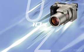  2000年的奥林巴斯数码相机 Olympus Digital Cameras C 2100 Ultra Zoom Olympus 奥林巴斯70年经典相机壁纸(上辑) 广告壁纸