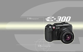  奥林巴斯数码相机E 300 Olympus Digital Cameras E 300 Olympus 奥林巴斯70年经典相机壁纸(上辑) 广告壁纸